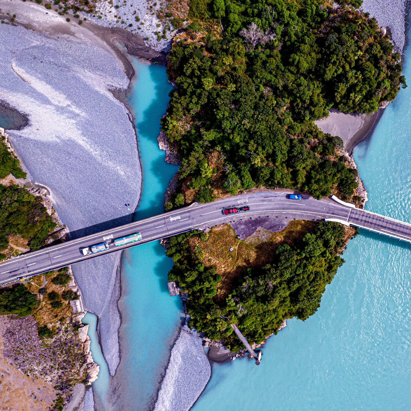 Aerial photo of cars driving over Rakaia Gorge Bridge over Rakaia River, New Zealand, Aerial photo of cars driving over Rakaia Gorge Bridge over Rakaia River, New Zealand,